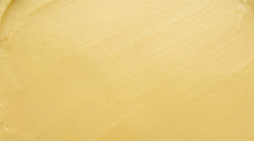 An AI generated image of a yellow textured Beauty Balm with Vitamin C Ascorbyl Glucoside.