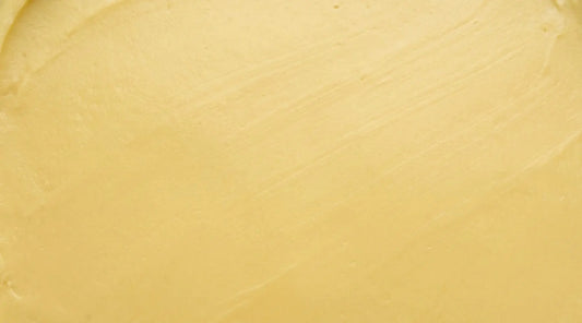 An AI generated image of a yellow textured Beauty Balm with Vitamin C Ascorbyl Glucoside.