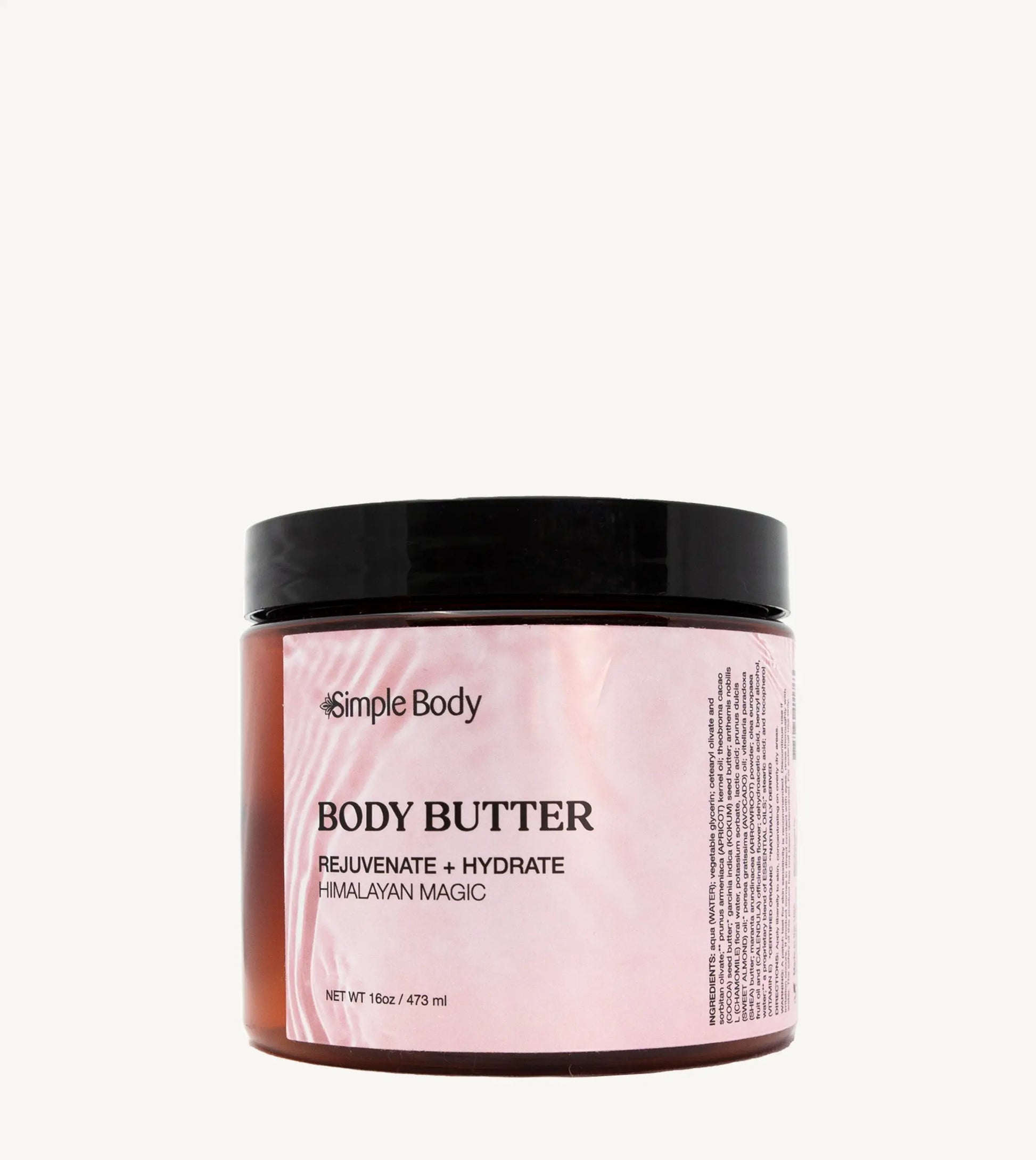 Jar of Simple Body Himalayan Magic body butter with pink label on tan background