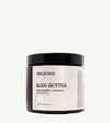 Jar of Simple Body body butter on a tan background
