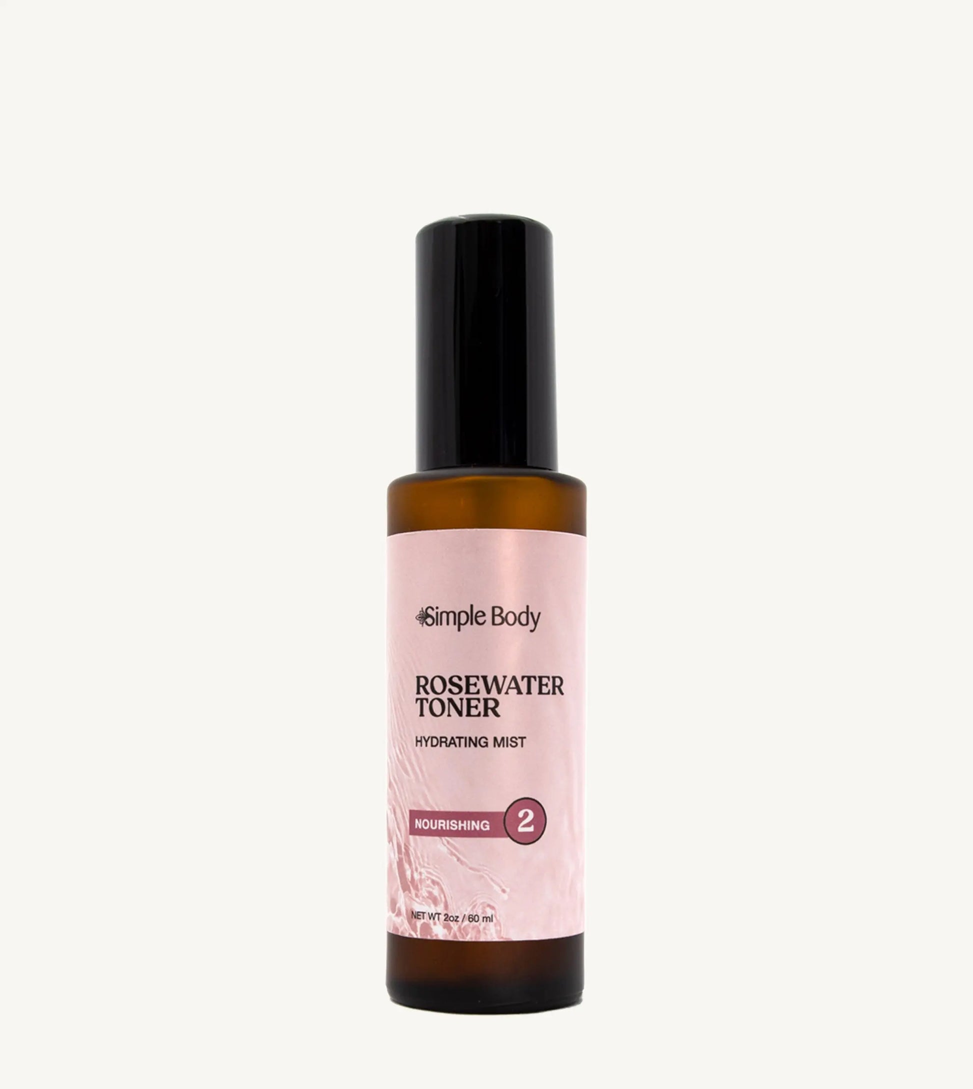 A bottle of Rosewater Face Toner by Simple Body. The bottle is amber transparent with a black cap.