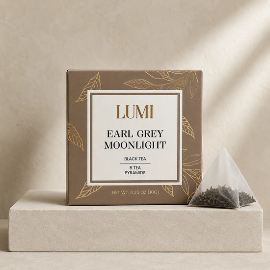 Lumi Earl Grey Moonlight black tea packaging on a beige background