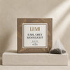 Lumi Earl Grey Moonlight black tea packaging on a beige background