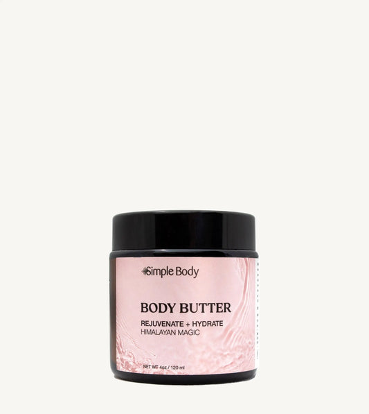 Jar of Simple Body Himalayan Magic body butter on a tan background