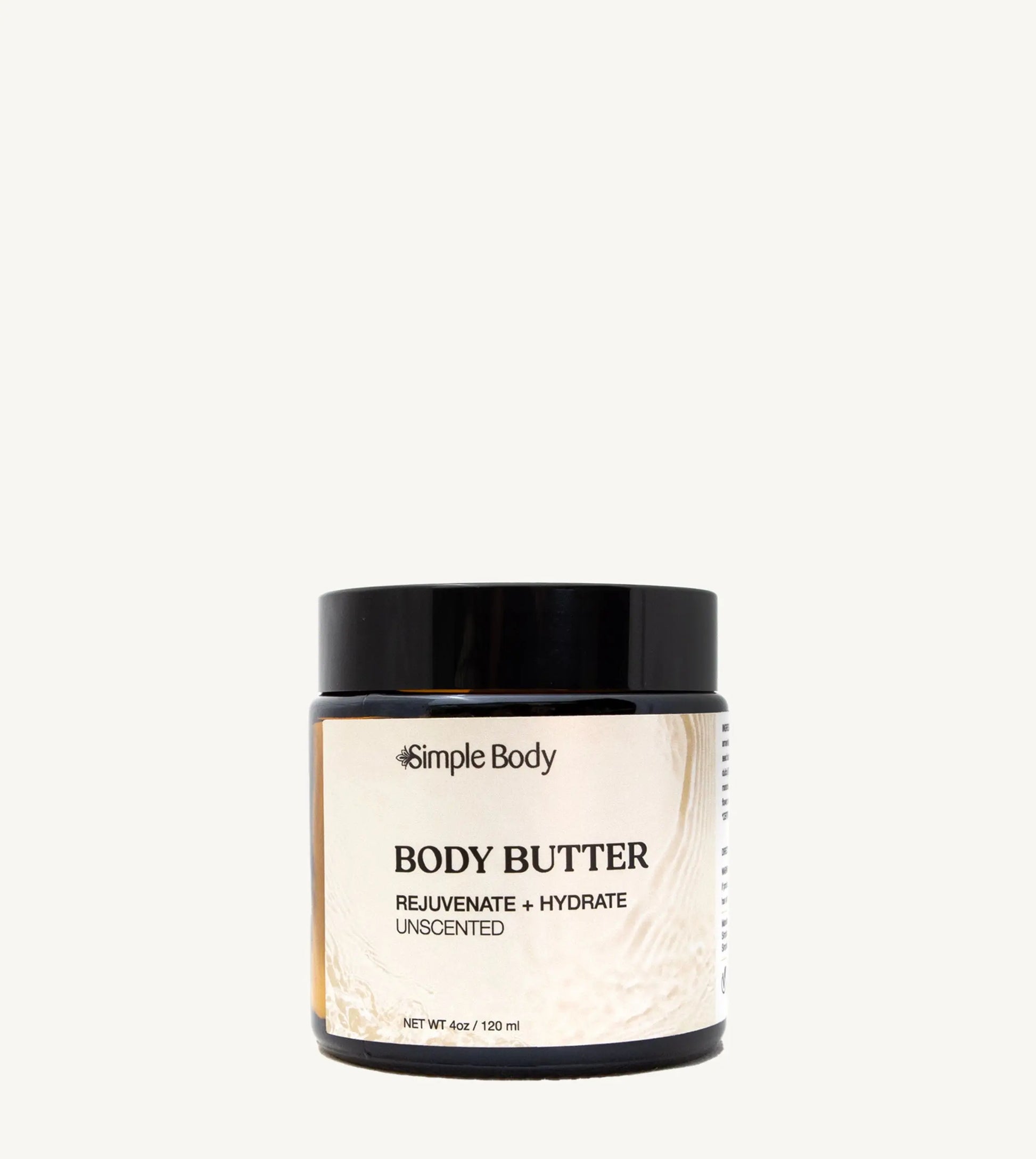 Jar of Simple Body body butter on a tan background