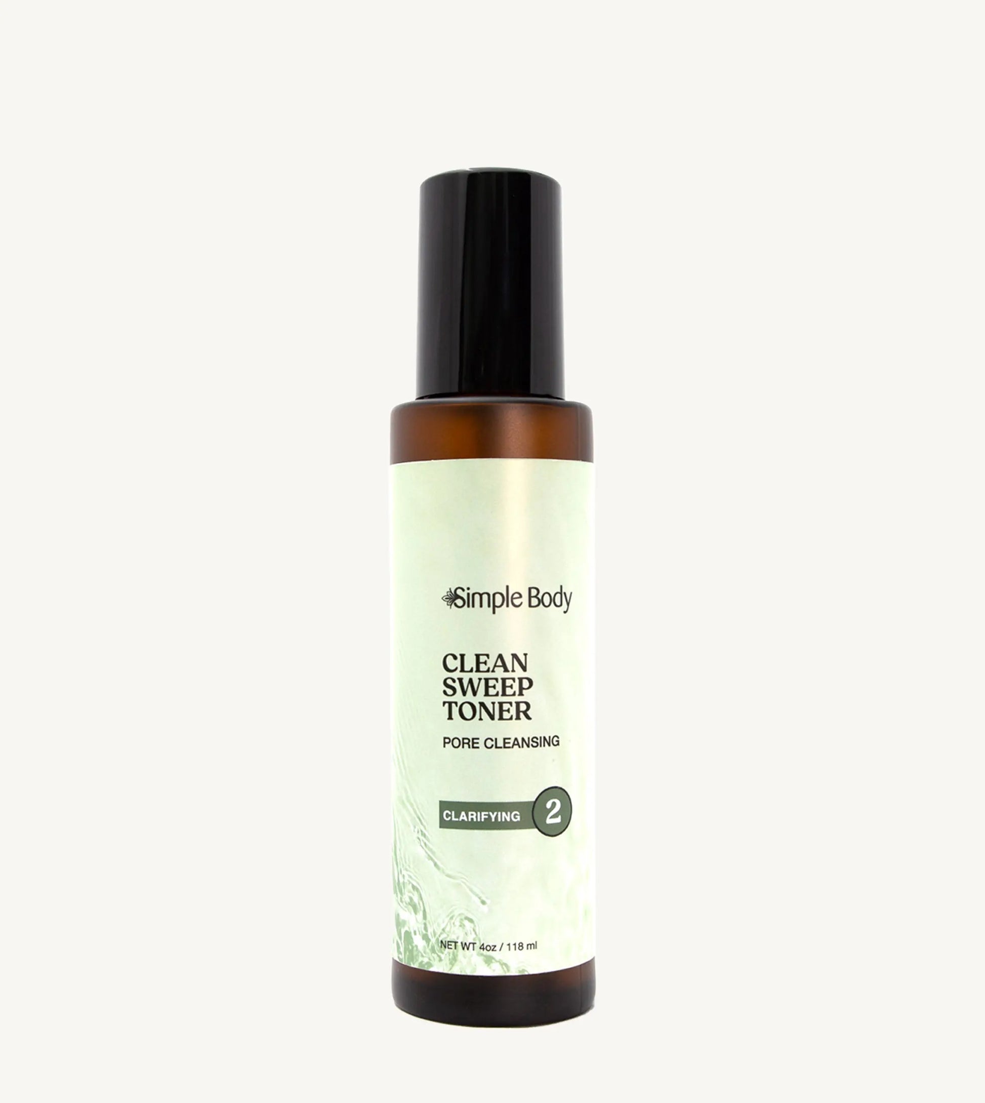 Simple Body Clean Sweep Toner bottle on a tan background