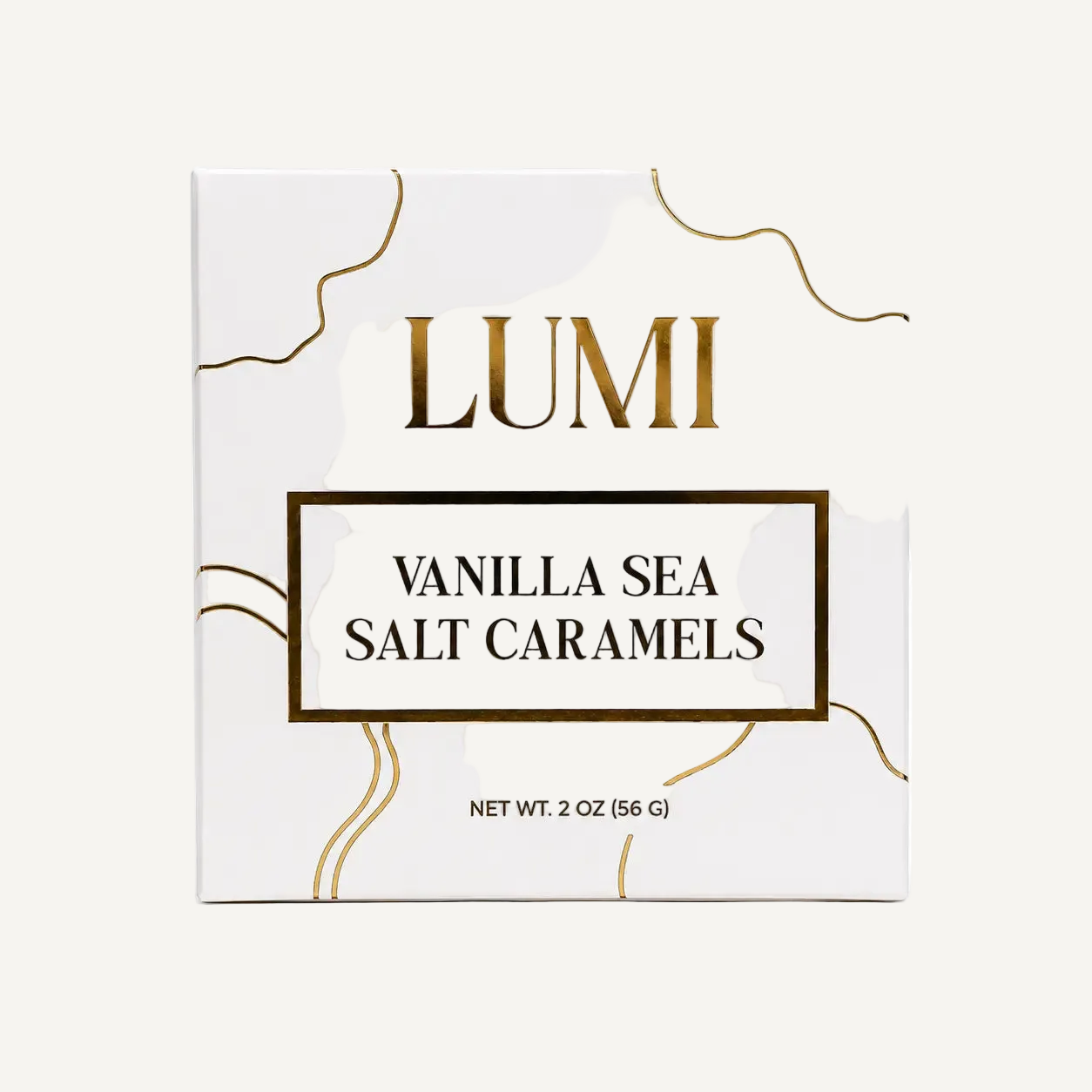 LUMI Vanilla Sea Salt Caramels packaging box, featuring a white background with elegant gold wavy lines and gold lettering.