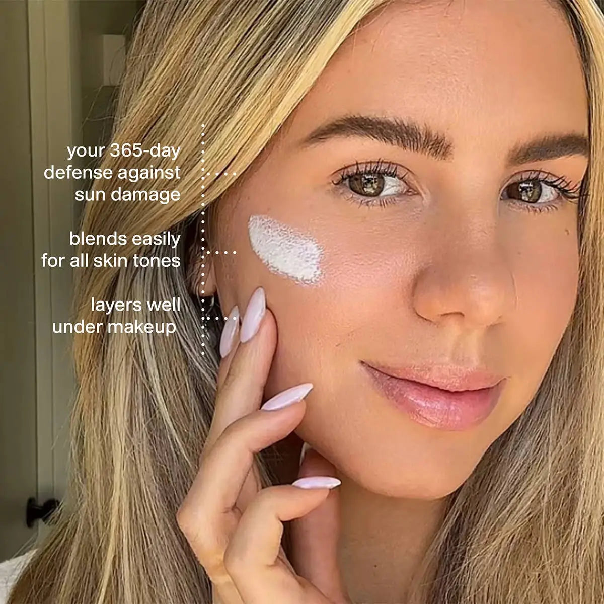 Woman applying a skincare product to her face with text highlighting its benefits.