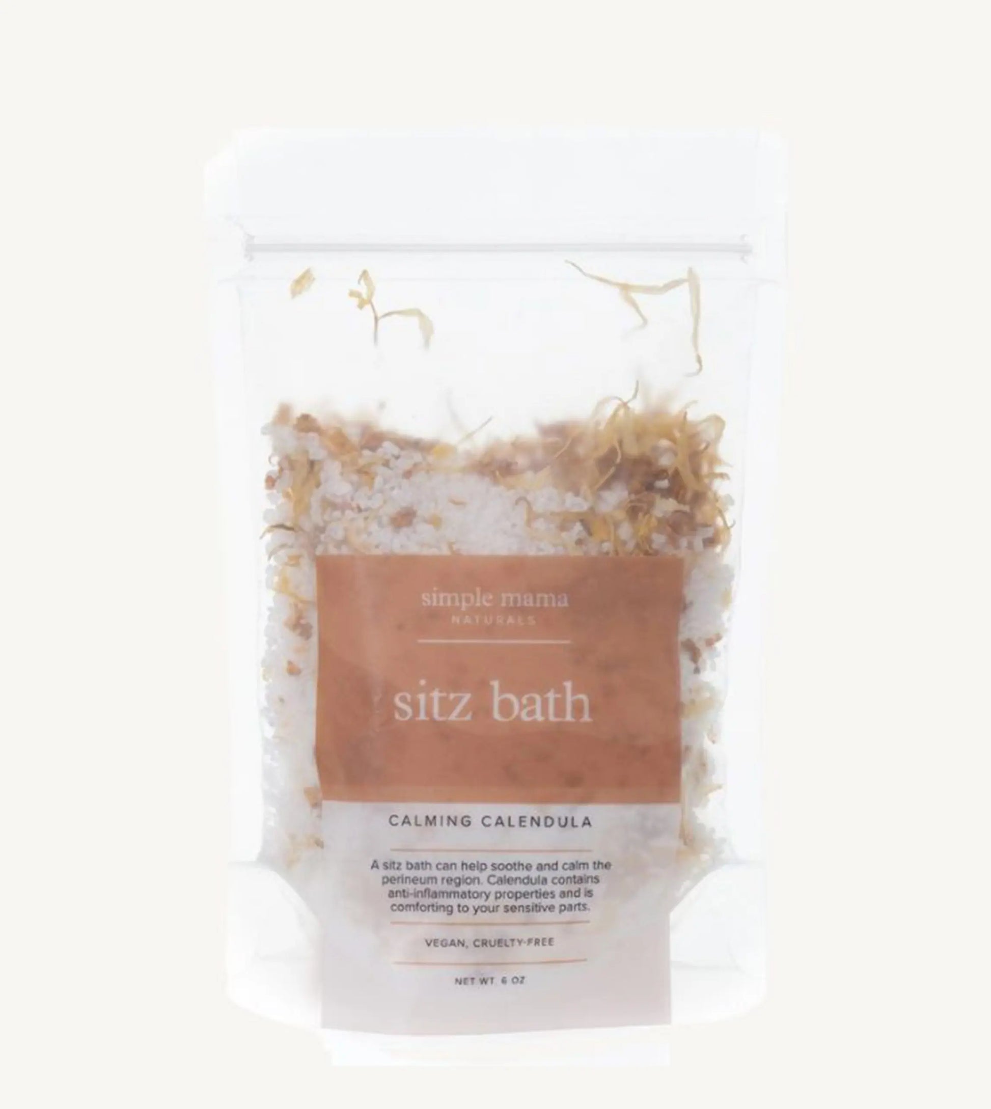 A package of Simple Mama Sitz Bath Calming Calendula, with visible natural botanicals inside a clear plastic bag.