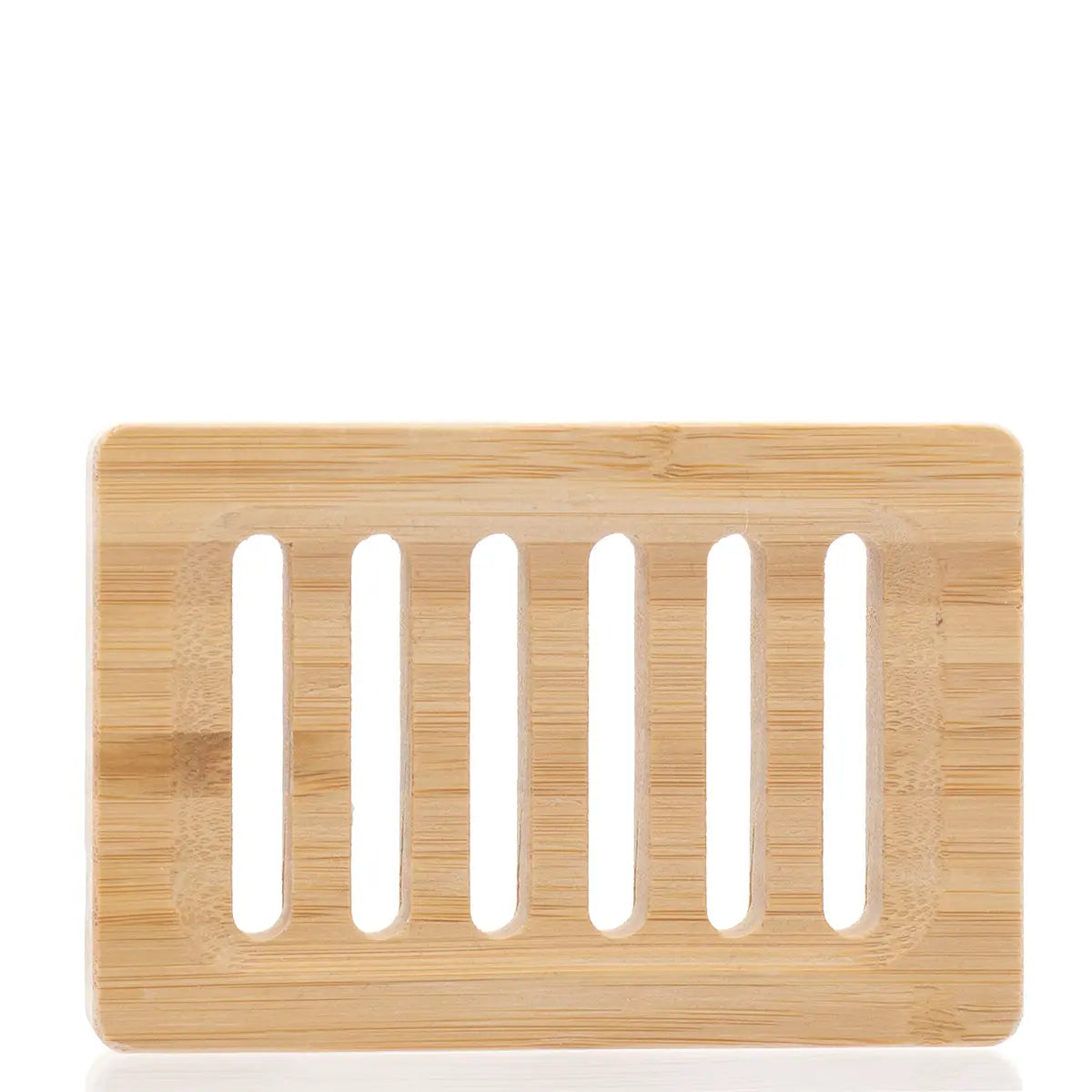 Bamboo soap dish with slotted design on a white background