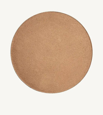 A round image of Pure Anada's Bronzed Clove Cheek color and Bonzer which is a medium beige tan.