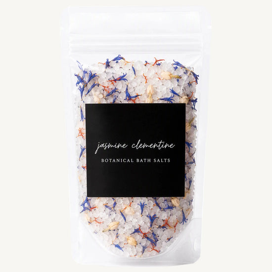 Jasmine Clementine Botanical Bath Salts in a stand up pouch on a white background.