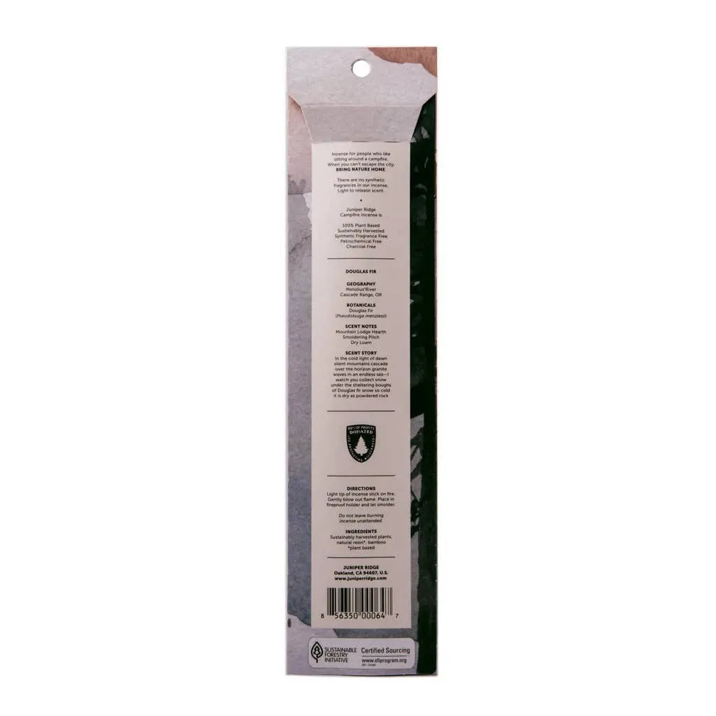 The back of a tall, narrow retail package of Juniper Ridge Campfire Incense in Sweetgrass shown upright on a plain white background. 