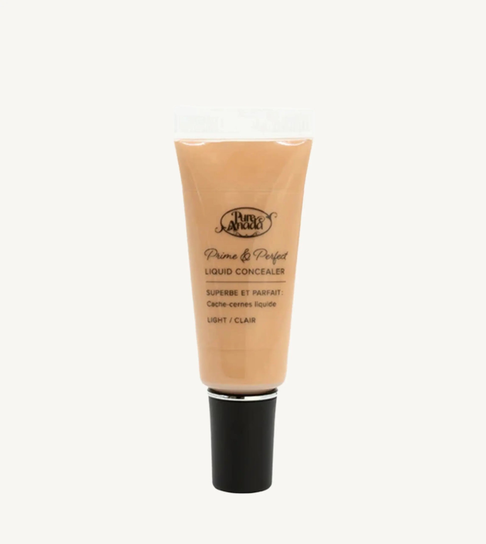 A photo of Pure Anada's Liquid Concealer in Light which is a warm beige color on a tan background.