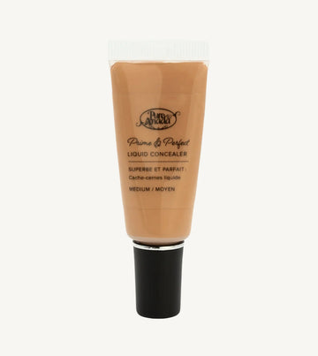 A photo of a tube of Pure Anada's Liquid Concealer in Medium which is a medium to dark tan color on a tan background.