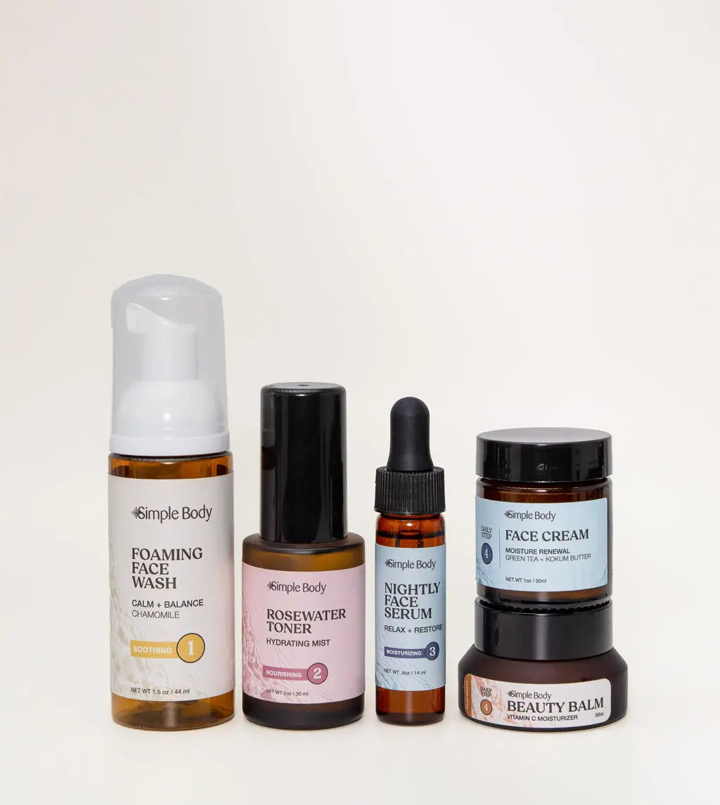 A Mini Starter Skincare kit for sensitive skin including a Foaming Face Wash, Rosewater Toner, Nightly Face Serum, Face Cream, and Beauty Balm on a light tan background.