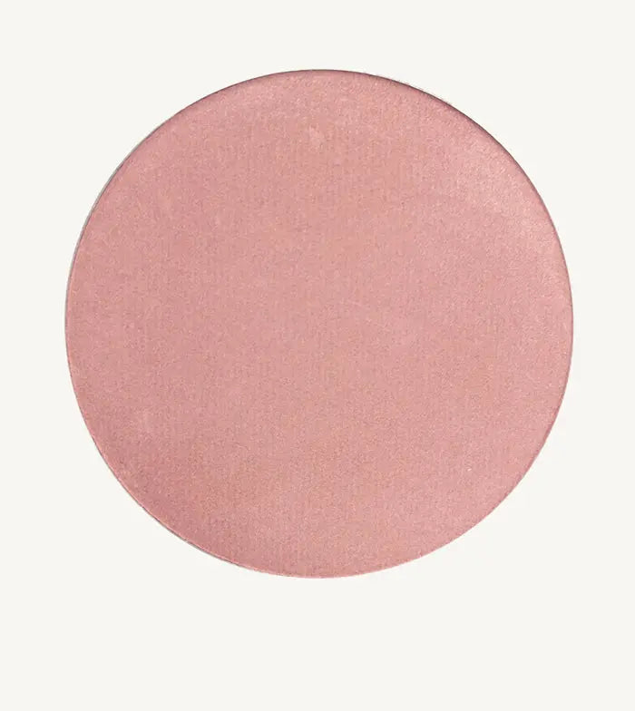 Round Pink image of Pure Anada Sweet Pea Cheek Color that has a rosey-pink, shimmery hue to it.
