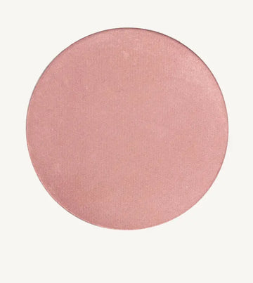 Round Pink image of Pure Anada Sweet Pea Cheek Color that has a rosey-pink, shimmery hue to it.