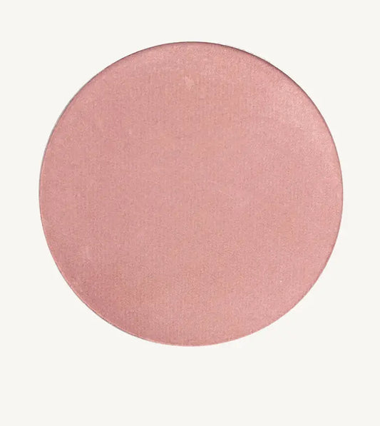 Round Pink image of Pure Anada Sweet Pea Cheek Color that has a rosey-pink, shimmery hue to it.
