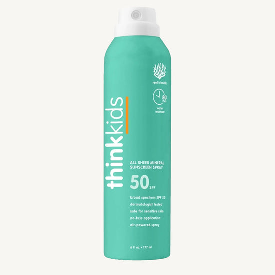 Think Kids sunscreen spray bottle on a white background