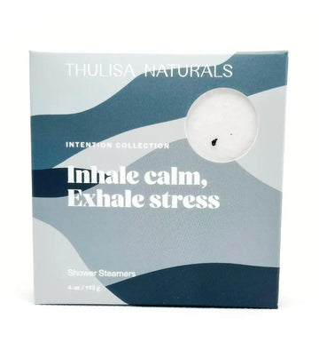 A photo of a box with blue organic shapes on it that has Thulisa Naturals, Intention Collection, Inhale calm, Exhale stress shower steamers on it on a white background