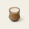 Vintage Amber Brown Glass Candle with two wicks on a white background