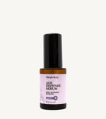Age defense serum bottle with black cap and purple label on a white background