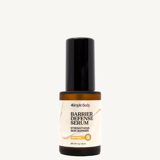 Barrier Defense Serum bottle on a tan background