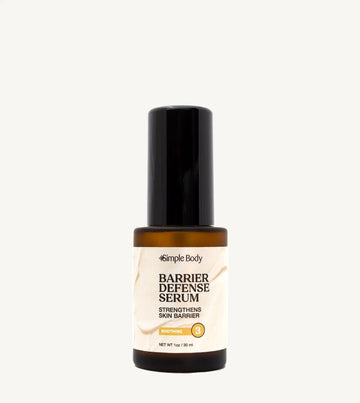Barrier Defense Serum bottle on a tan background
