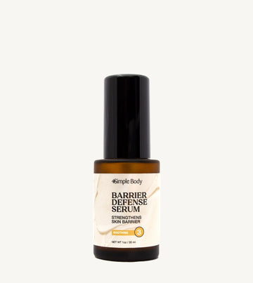 Barrier Defense Serum bottle on a tan background