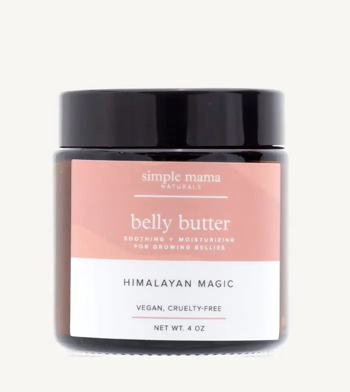 Jar of Simple Mama Himalayan Magic Belly Butter with pink label on a tan background