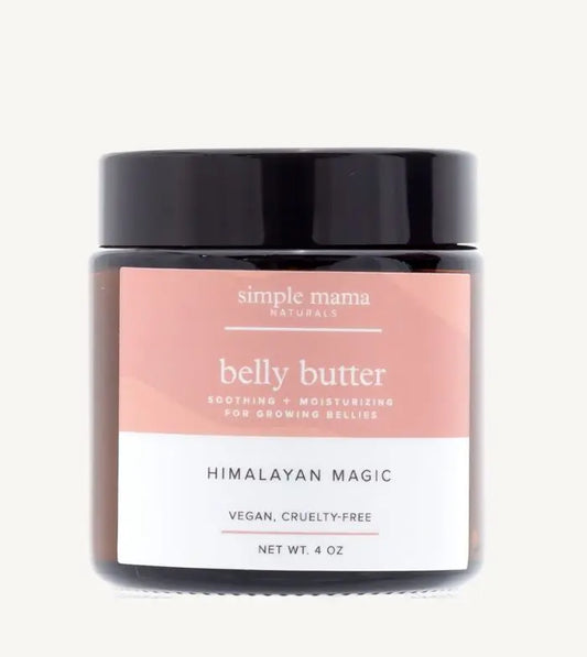 Jar of Simple Mama Himalayan Magic Belly Butter with pink label on a tan background