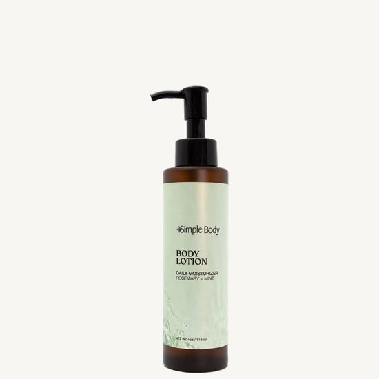 Simple Body Rosemary Mint body lotion bottle with pump on a tan background