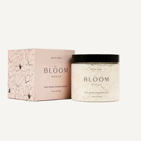 Bloom Bath Co jar of Wild Rose and Sandalwood Bath Soak and box on a white background