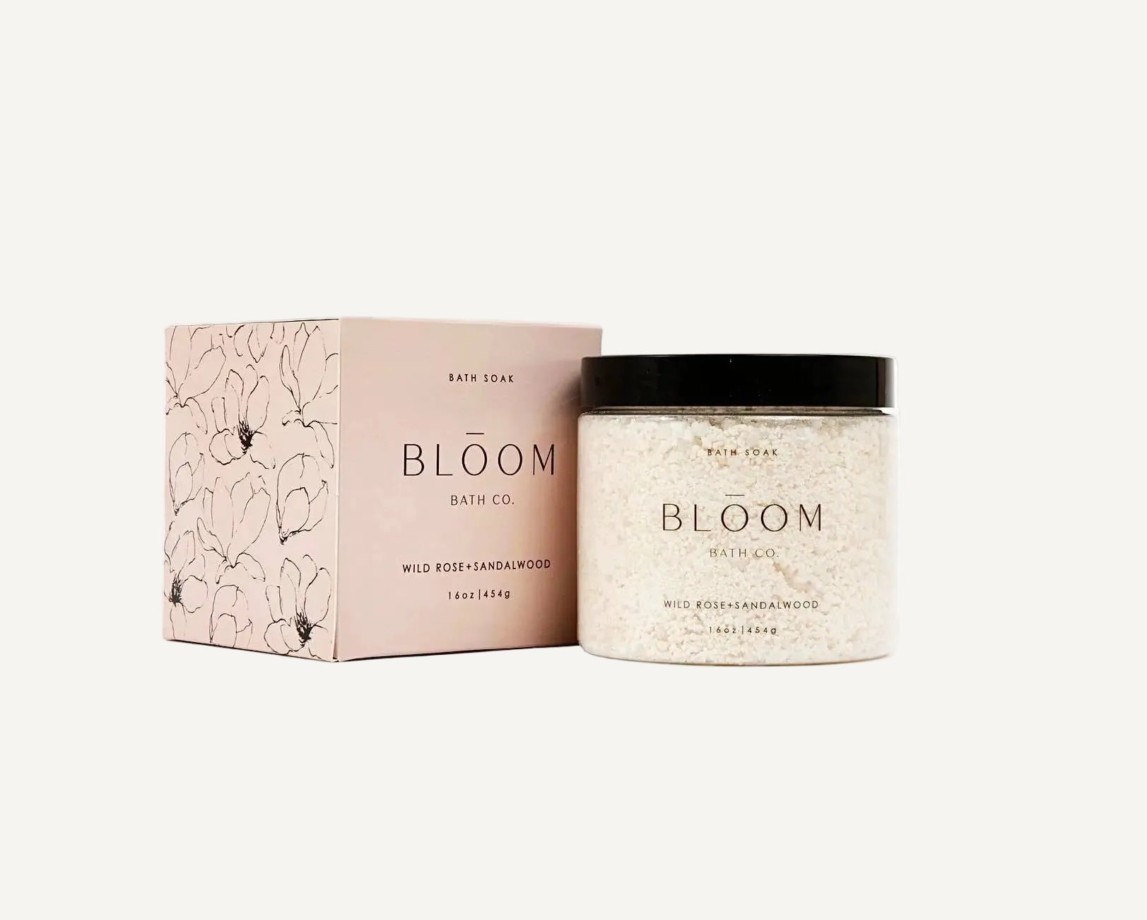 Bloom Bath Co jar of Wild Rose and Sandalwood Bath Soak and box on a white background