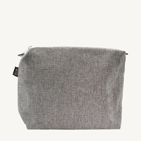 A gray linen cosmetic bag with a zipper closure and a tag visible on the side.