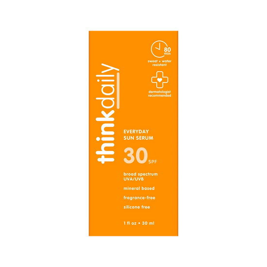 Orange packaging of thinkdaily Everyday Sun Serum with SPF 30 on a white background