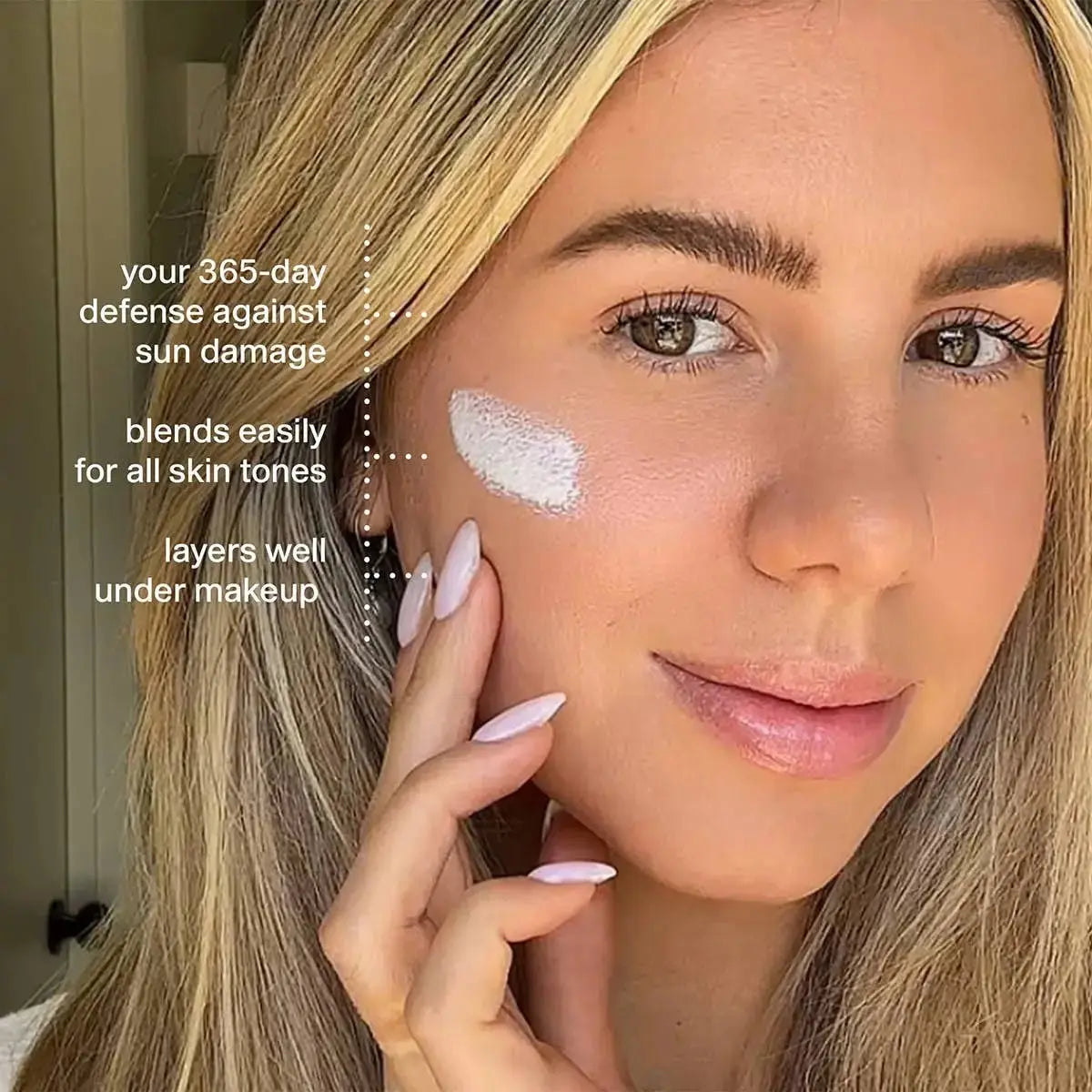 Woman applying a skincare product to her face with text highlighting its benefits.