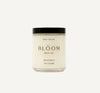 Jar of body polish from Bloom Bath Co. on a white background