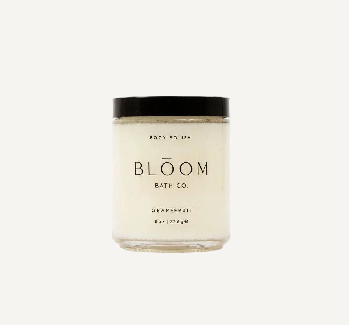 Jar of body polish from Bloom Bath Co. on a white background