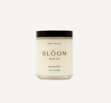 Jar of body polish from Bloom Bath Co. on a white background