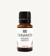 Bottle of Simple Body Cinnamon Organic Essential Oil on a white background