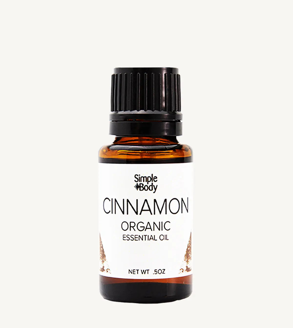 Bottle of Simple Body Cinnamon Organic Essential Oil on a white background