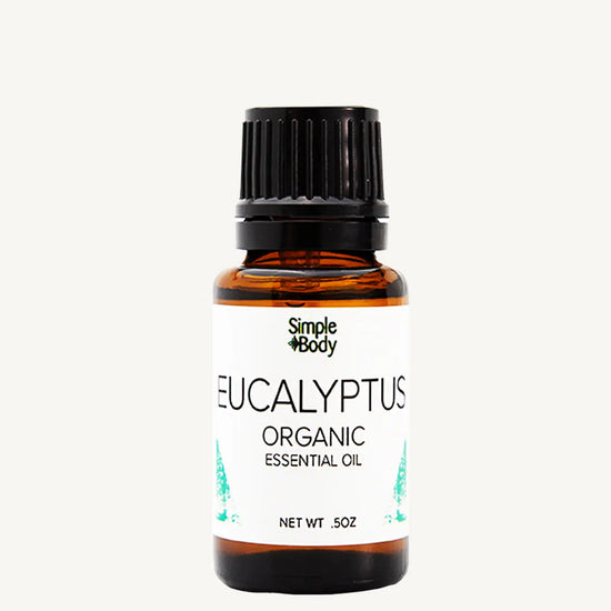 Bottle of Simple Body Eucalyptus Organic Essential Oil on a white background