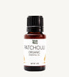 Bottle of Simple Body Patchouli Organic Essential Oil on a white background