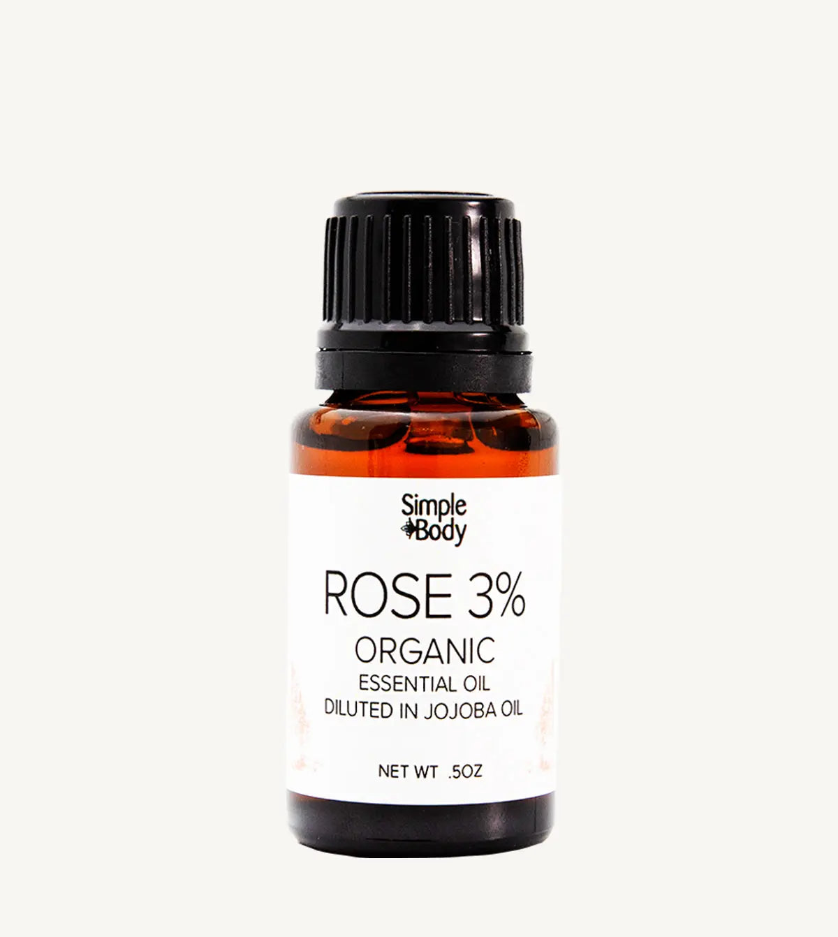 Bottle of Simple Body Rose 3% Organic Essential Oil on a white background