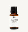 Tea tree organic essential oil bottle with a white background