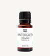 Bottle of Simple Body Wintergreen Organic Essential Oil on a white background