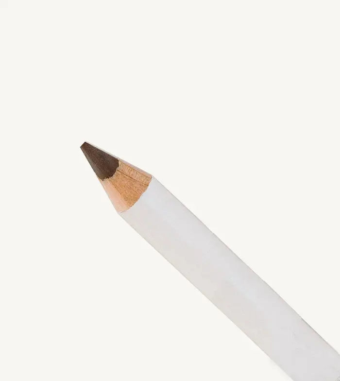 White makeup pencil with brown tip on a white background