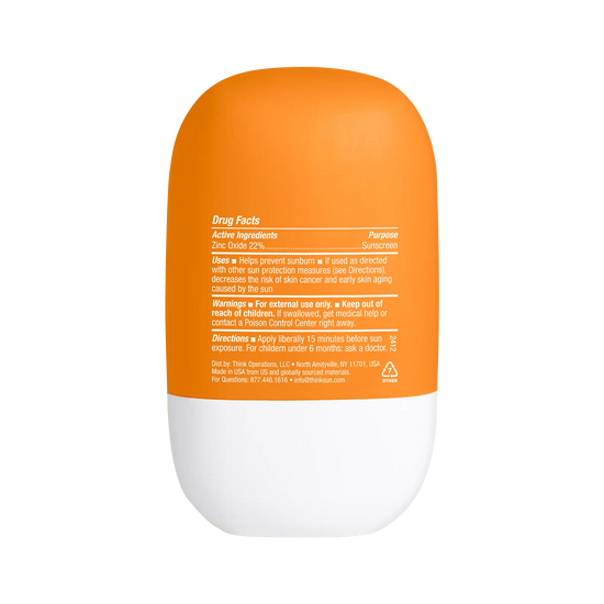 Orange and white bottle with text on a white background